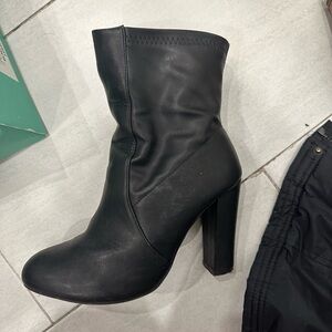 Black booties with a 3” heel.